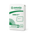 White and green bag of OMNI K fertilizer with Omnia Nutrionology branding on a white background