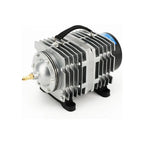 Metallic compressor on a white background